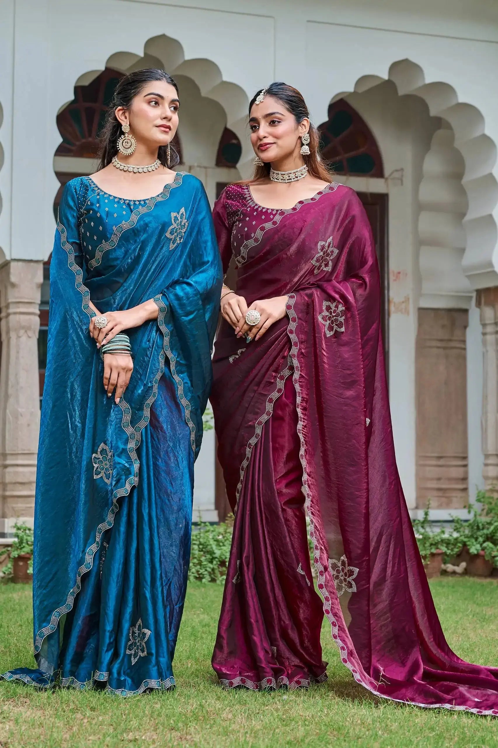 Navy Blue and Wine Diamond Work Sarees styled together, candid pose